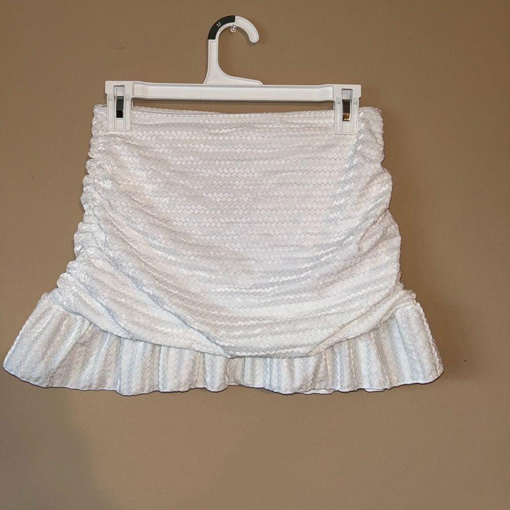 Size Medium white skirt with ruffles at bottom